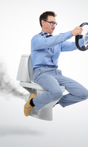 man on toilet with a wheel